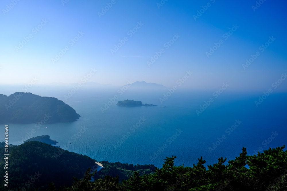 Mountain, islands and misty sea