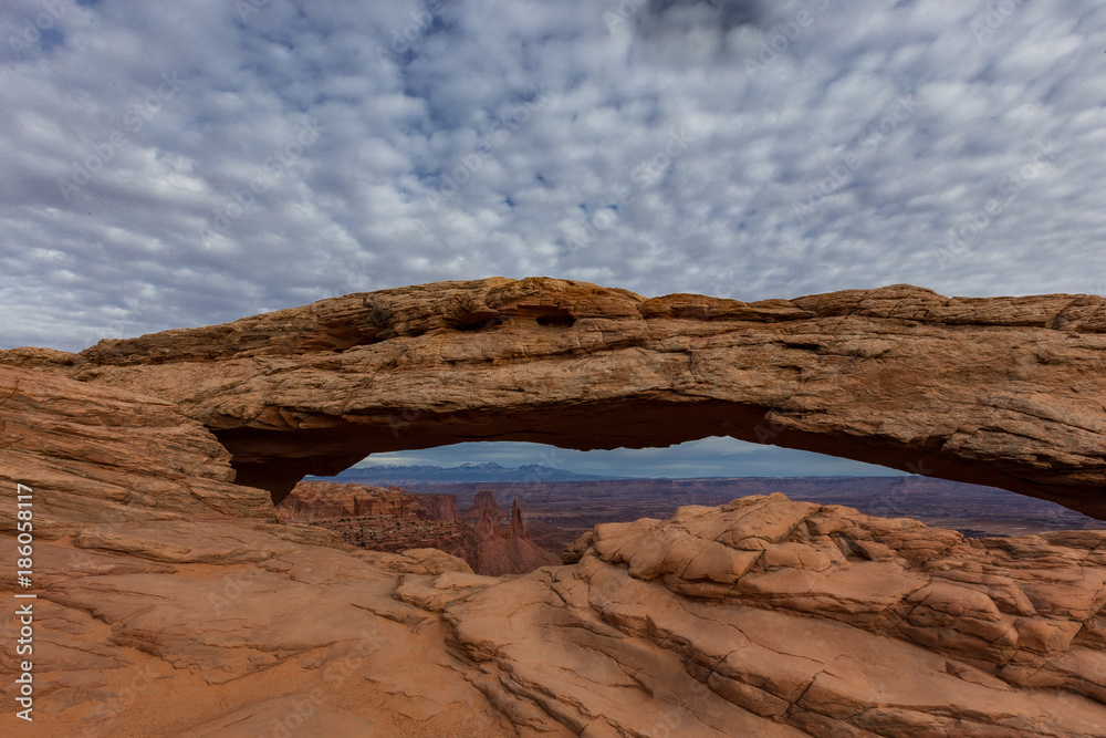 The view through Mesa Arch in canyonlands national park near Moab utah