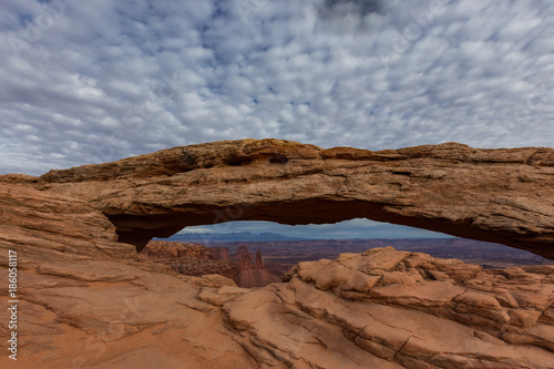 The view through Mesa Arch in canyonlands national park near Moab utah