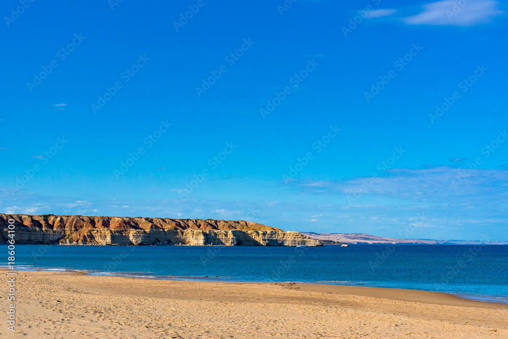 Picturesque beach landscape with cliffs