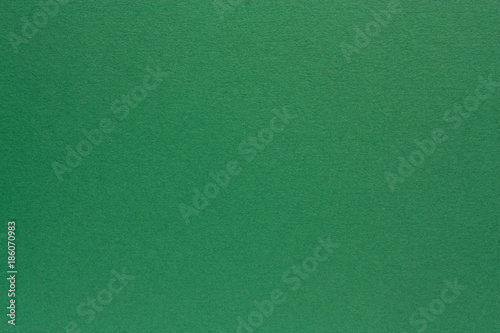 Green washed paper texture background. Recycled paper texture.