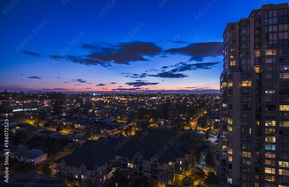 Urban living. Apartment building in a residential area on a beautiful evening