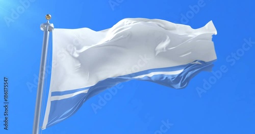 Flag of Altai Republic waving at wind with blue sky, loop photo