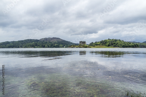 Castle Tioram - a ruined castle on a tidal island in Loch Moidart, Lochaber, Highland, Scotland photo