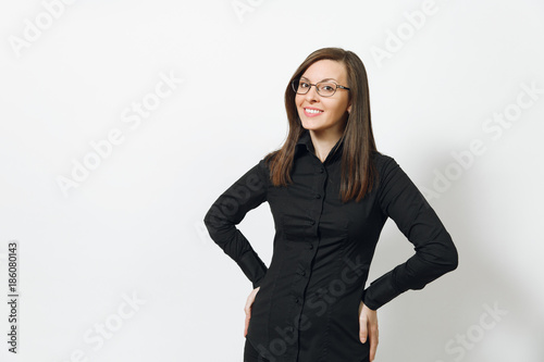 Beautiful happy caucasian young smiling brown-hair business woman in black classic shirt, skirt, glasses isolated on white background close up. Manager, worker, student. Copy space for advertisement.