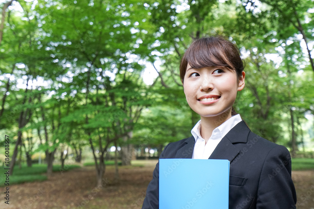 Businesswoman holding files Businesswoman holding files