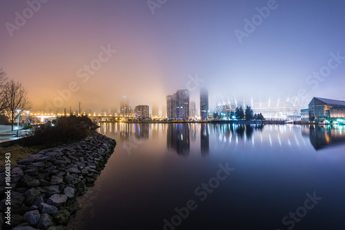 VANCOUVER - CIRCA 2013: Night fog at False Creek, Vancouver with BC Stadium covered in fog