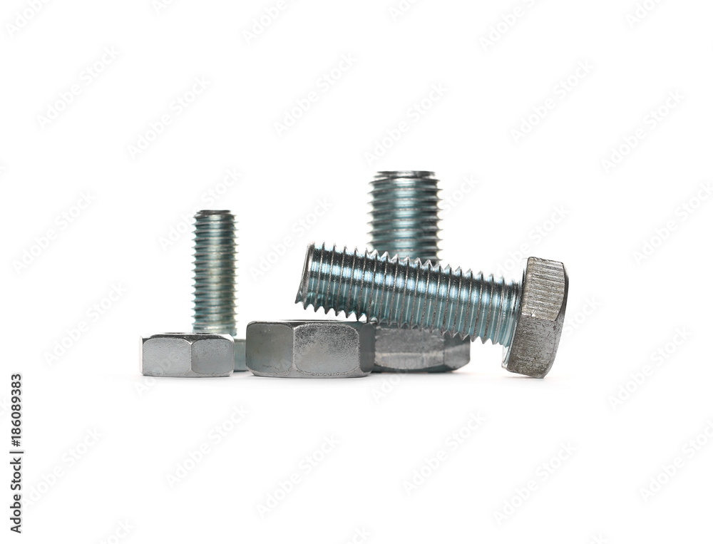 Pile metal screws, bolts and nuts isolated on white background Pile metal screws, bolts and nuts isolated on white background