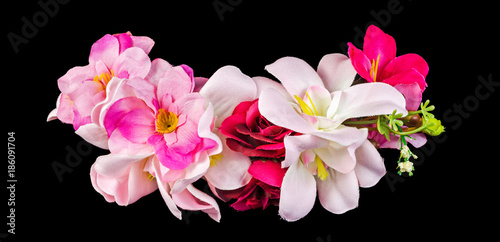 Artificial flowers isolated on black