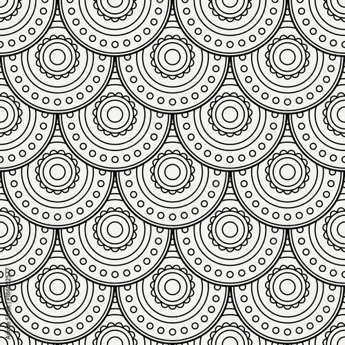 Seamless background pattern like a fish or cnake scales.