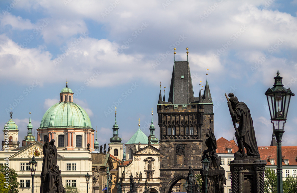 Fototapeta premium Saint Francis of Assisi church and Charles Bridge in Prague