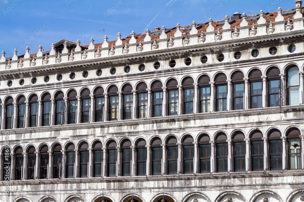 Arcades of the facade on Piazza San Marco in Venice, Italy