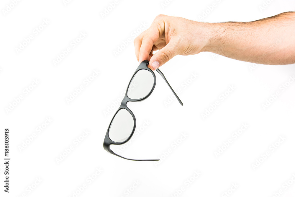 Hand Holding 3D TV Glasses On White Background Hand Holding 3D TV Glasses On White Background