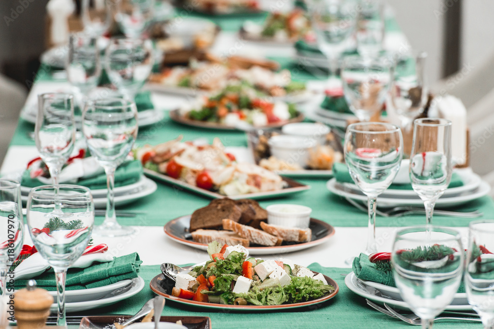 Served New Year or Christmas table closeup. Luxury restaurant