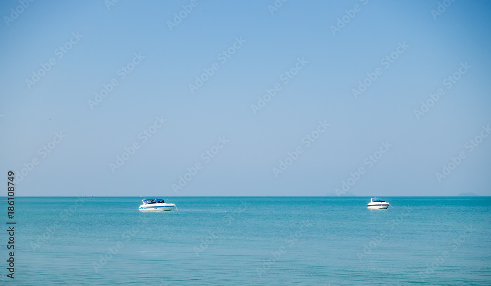 two boats in the tropical ocean