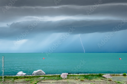 Dramatic before storm view at a turquoise lake