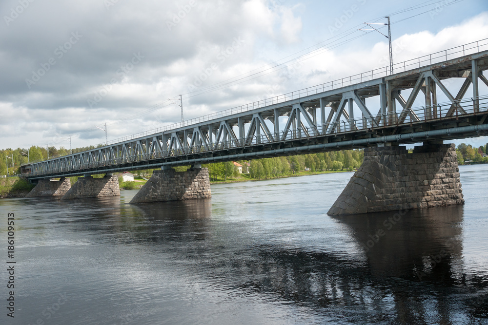 Road bridge over river in Rovaniemi, Finland Road bridge over river in Rovaniemi, Finland