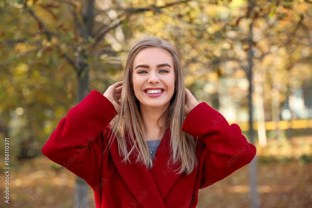 Beautiful smiling woman in park Beautiful smiling woman in park