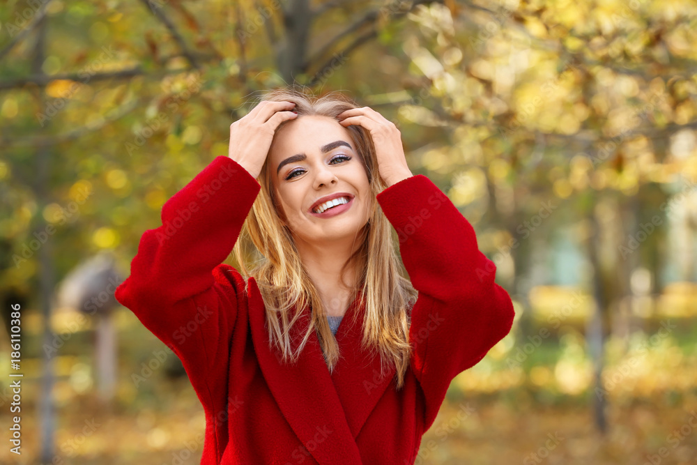 Beautiful smiling woman in park Beautiful smiling woman in park