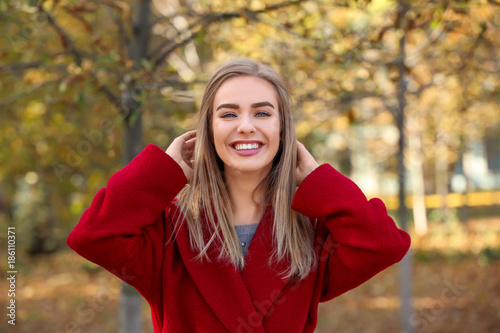 Beautiful smiling woman in ...