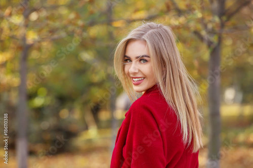 Beautiful smiling woman in ...