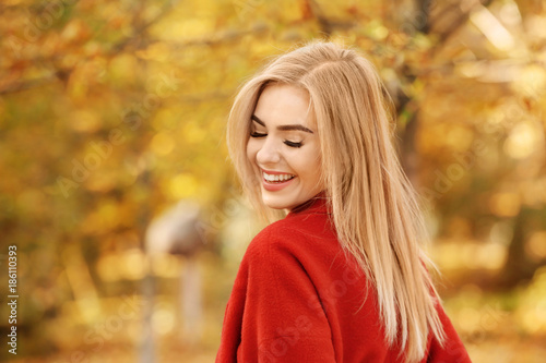 Beautiful smiling woman in ...