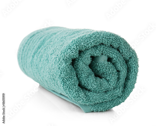 Rolled terry towel on white background