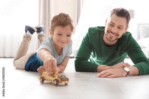 Cute little boy and father ...