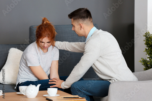 Male psychologist with clie...
