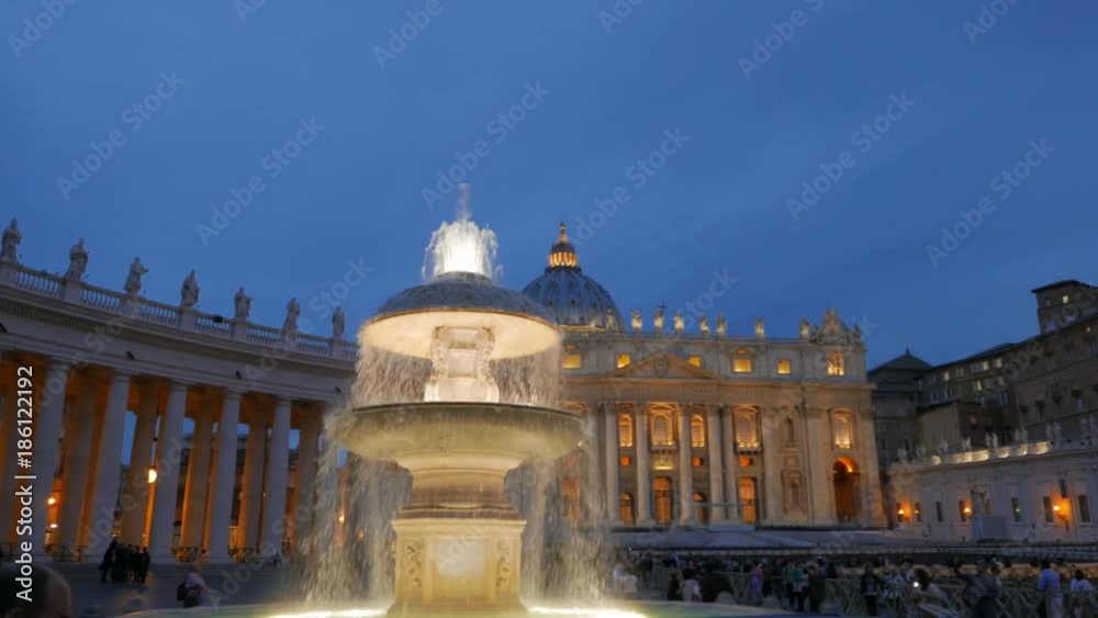 a panning shot of a fountain in saint peter's square in rome, italy a panning shot of a fountain in saint peter's square in rome, italy