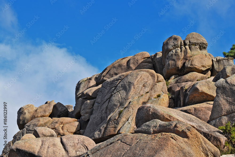 Pink granite rocks of a mountain