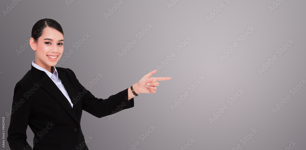 Business woman pointing her finger Business woman pointing her finger