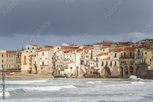 European Coastal travel townof Cefalu in Sicily, Italy in winter storm photo