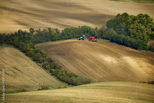 The tractor sows the fields, Moravia, Czech Republic