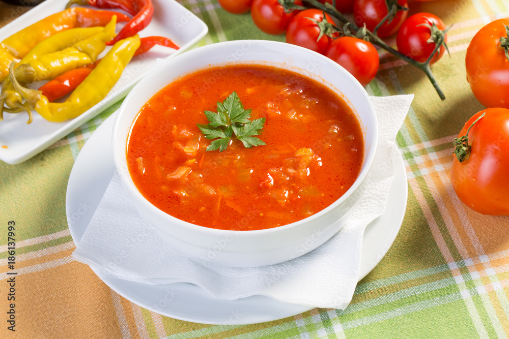 Close up of healthy vegetable soup with ingredients Close up of healthy vegetable soup with ingredients