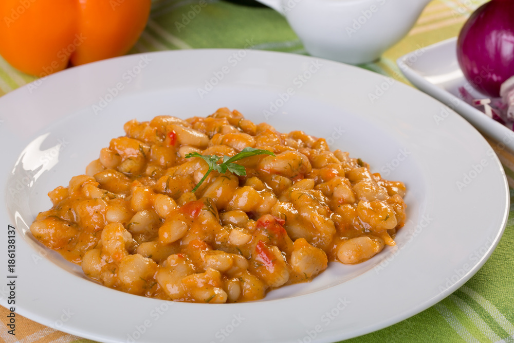 clopse up of cooked beans with ingredients clopse up of cooked beans with ingredients