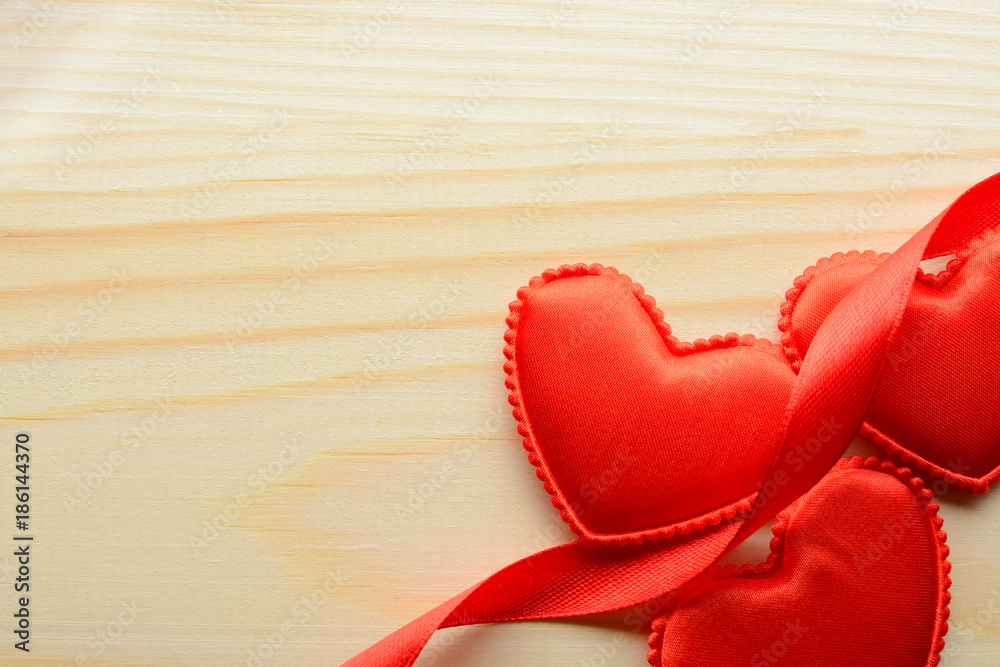 Fototapeta premium Red hearts and ribbons