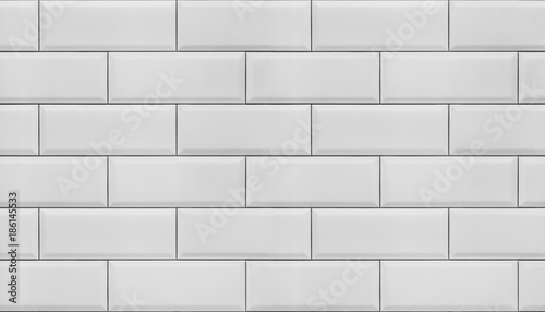 Wall of white tiles.