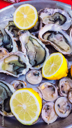 Oysters and lemon on a plate