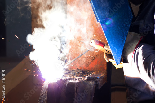 Glittering light of welding machine © overcrew