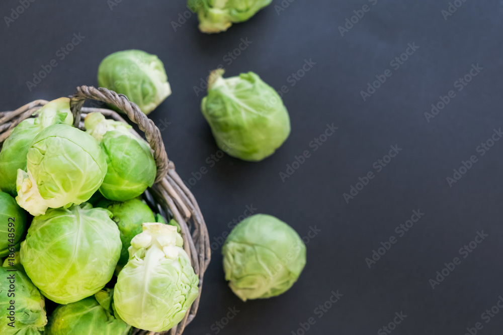 fresh raw brussels sprouts on a wooden table fresh raw brussels sprouts on a wooden table