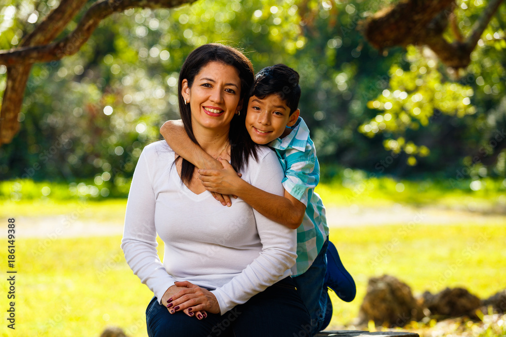 Fototapeta premium Mother and son outdoor portrait
