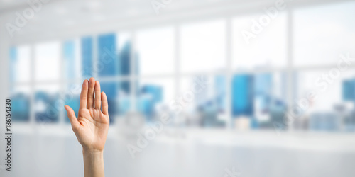 Free Download Choosing gesture of person in elegant modern interior in sunshine light - GFXLoad