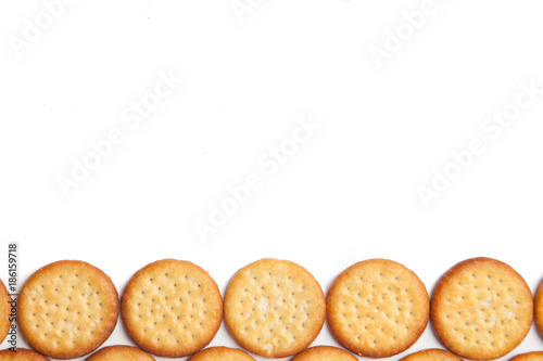Mini round cheese biscuit savoury snacks on a white background