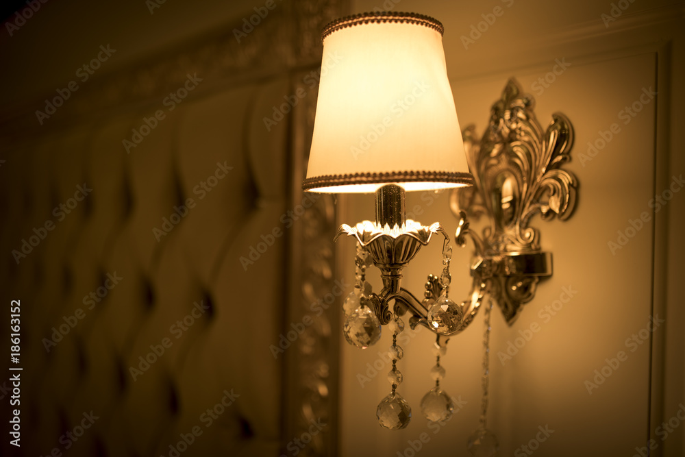 Golden chandelier onthe wall