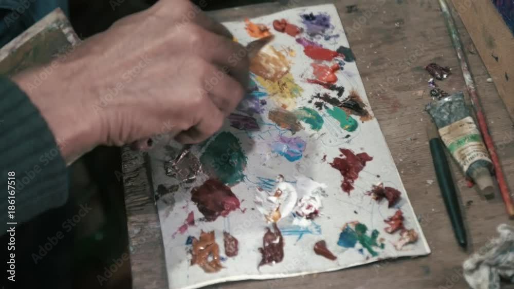 Real creative artist mixes paint for drawing (Underground) 4k Real creative artist mixes paint for drawing (Underground) 4k