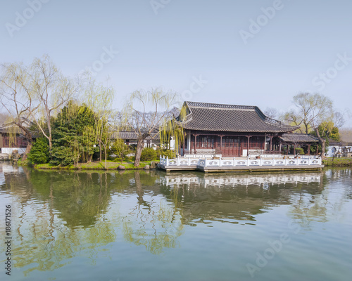 Ancient pavilion at dusk in early spring, located at Slender West Lake. The lake is a well-known scenic spot in the city of Yangzhou in Jiangsu province, China.