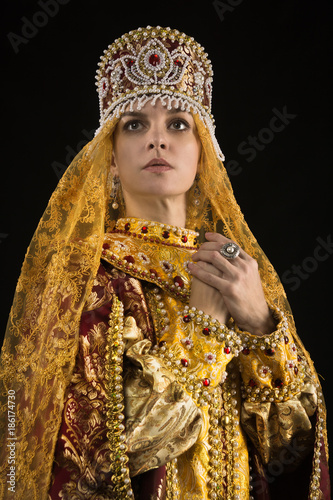 Russian queen in historical dress suit