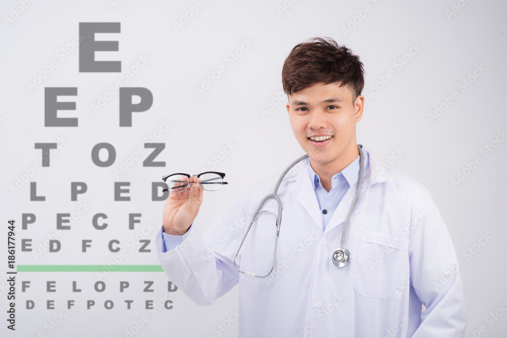 Optometrist looking at camera in medical office Optometrist looking at camera in medical office