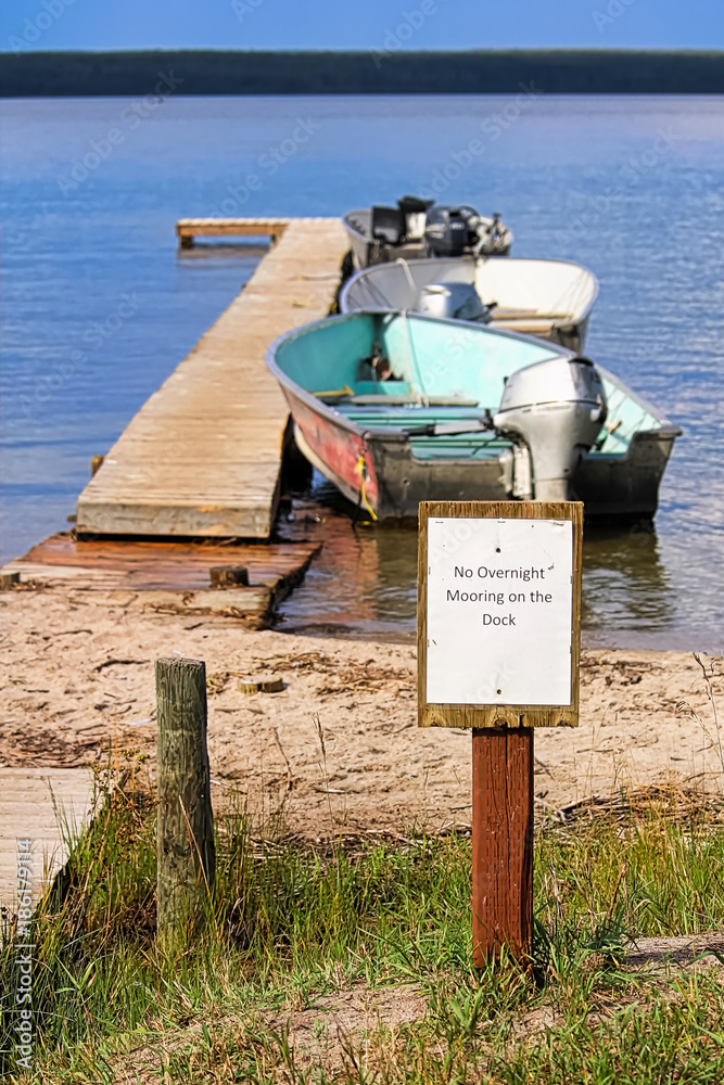 A no overnight mooring on the dock sign